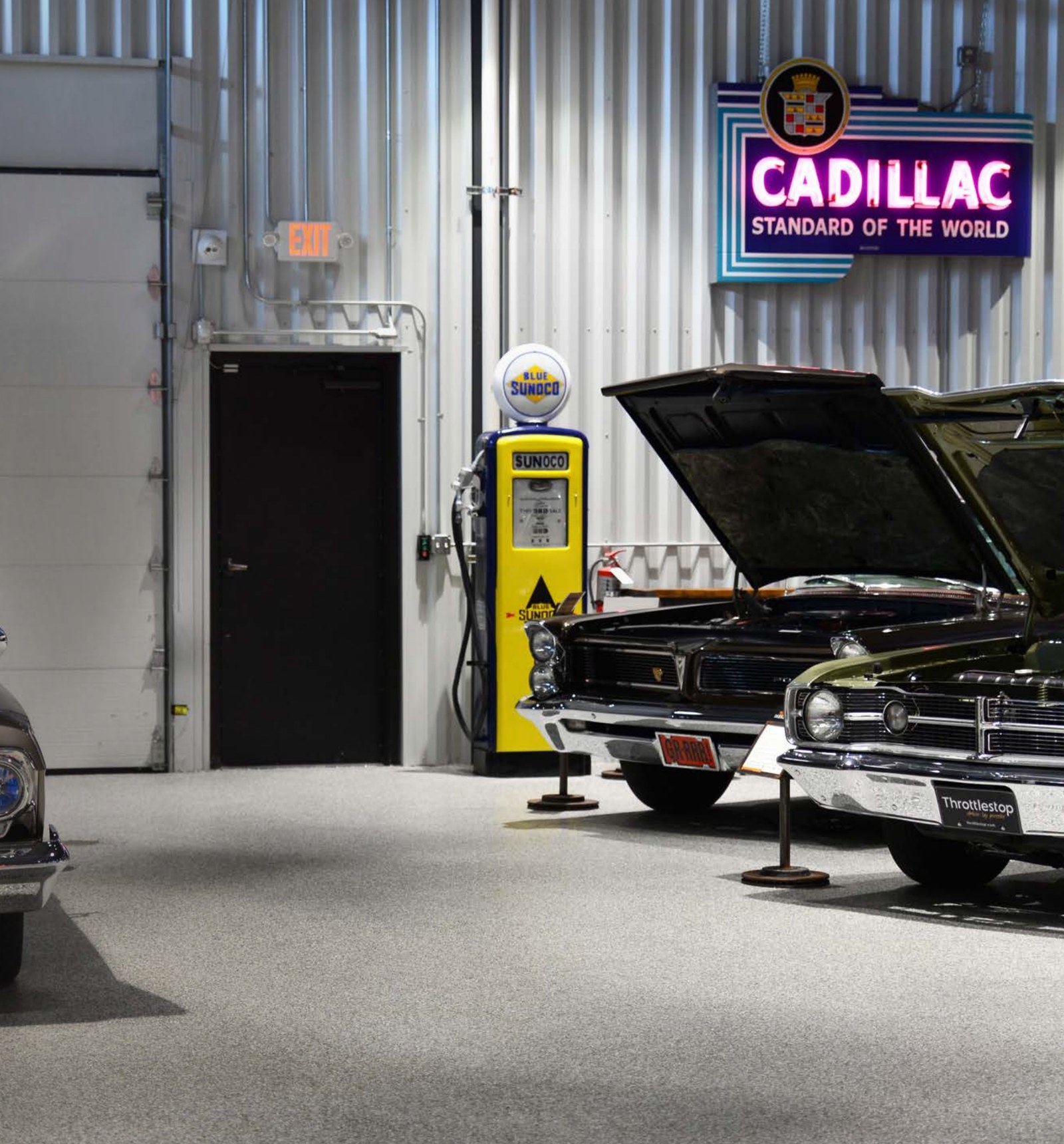 Epoxy garage floor with classic cars